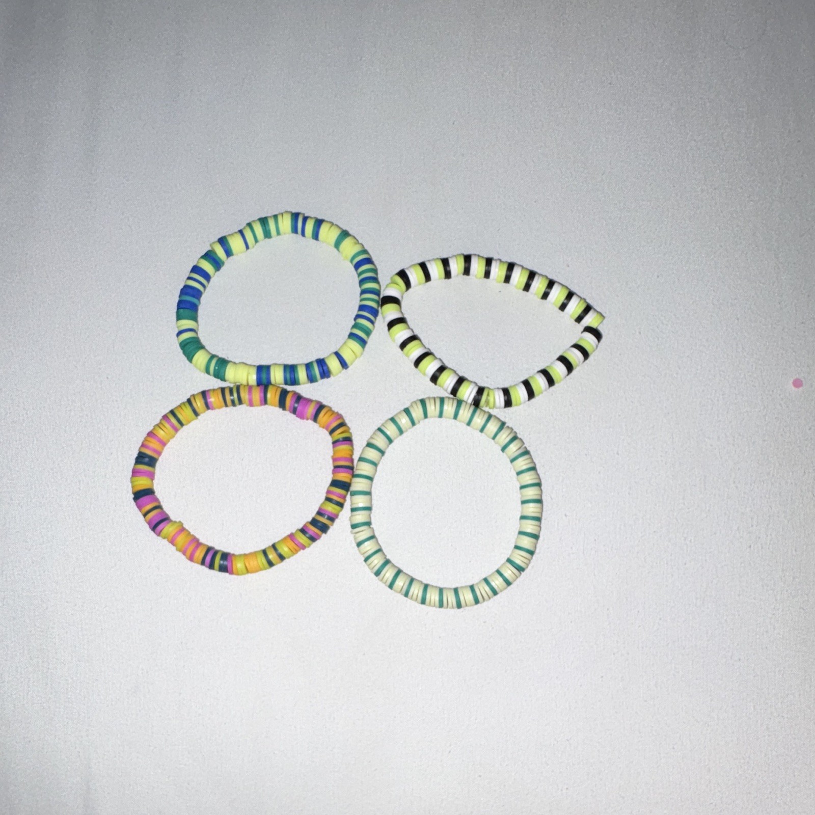 Set of 4 Multicolor Plastic Round Beaded Stretch Stackable Bracelets