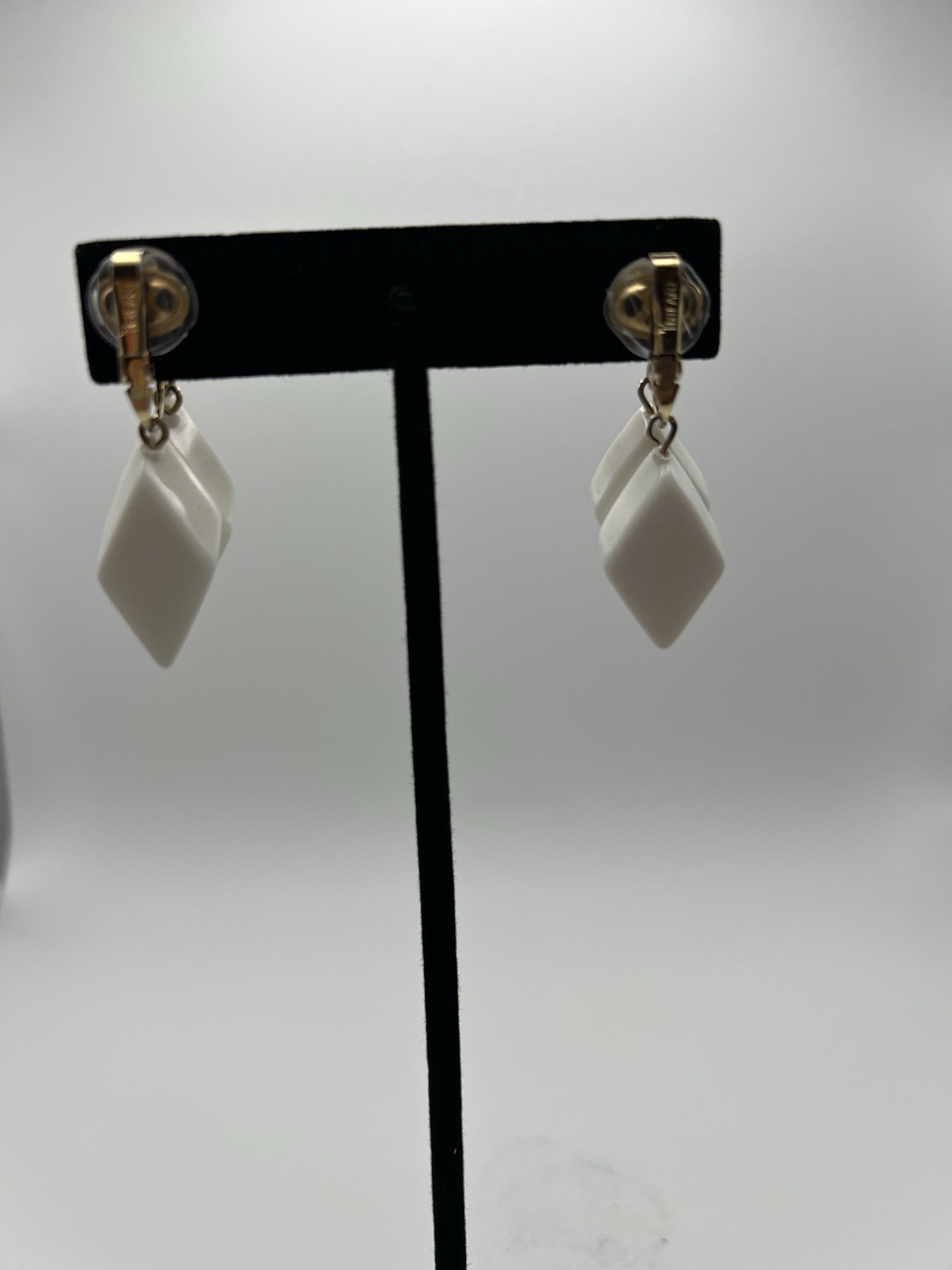 Trifari Signed Diamond Shape Clip-On earrings white & gold, lucite/acrylic