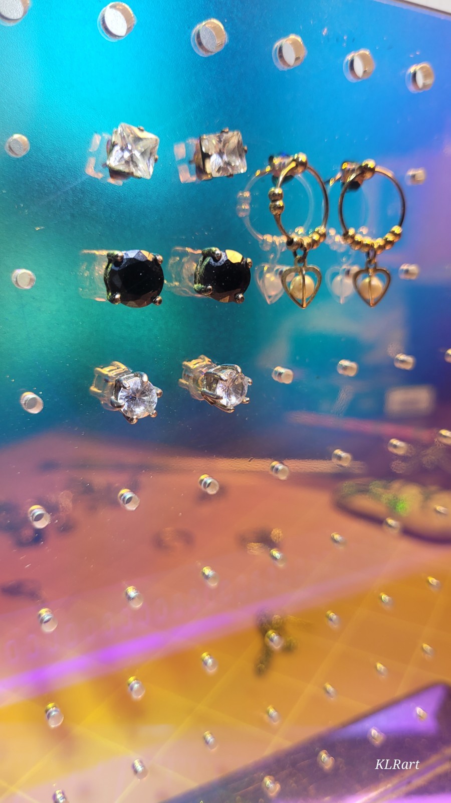 4 pair studs that do sparkle, gold plated pearls, large black Spinal studs
