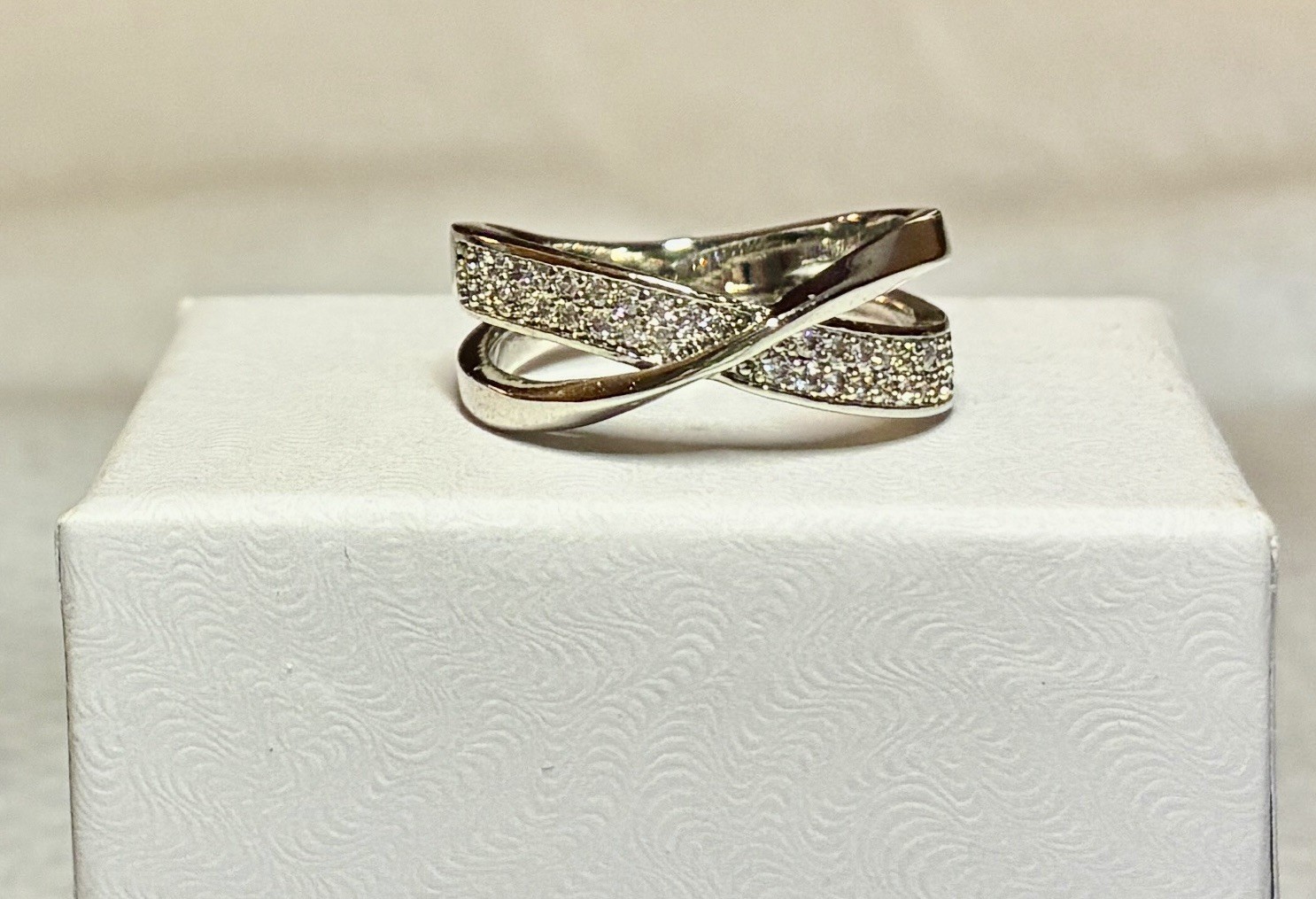 White Sapphire Cubic Zirconia in a 9.25 Sterling Silver Infinity Band Size 9.0