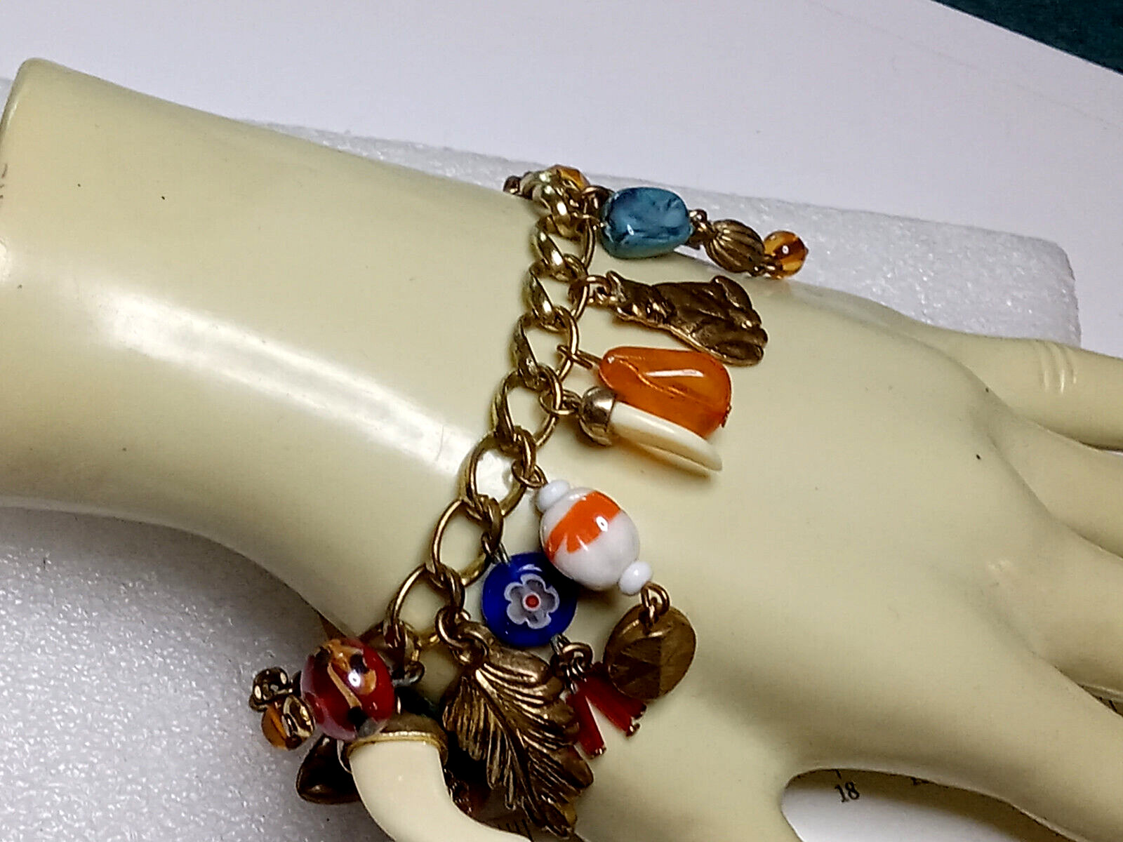 IKITA GOLD TONE CHA CHA MULTI STYLE CHARM BRACELET 7 “