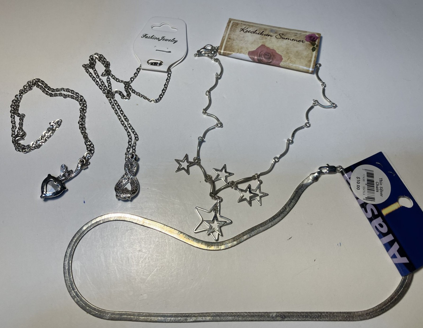 Necklace set – 4 necklaces. Misc set of new necklaces – good quality.