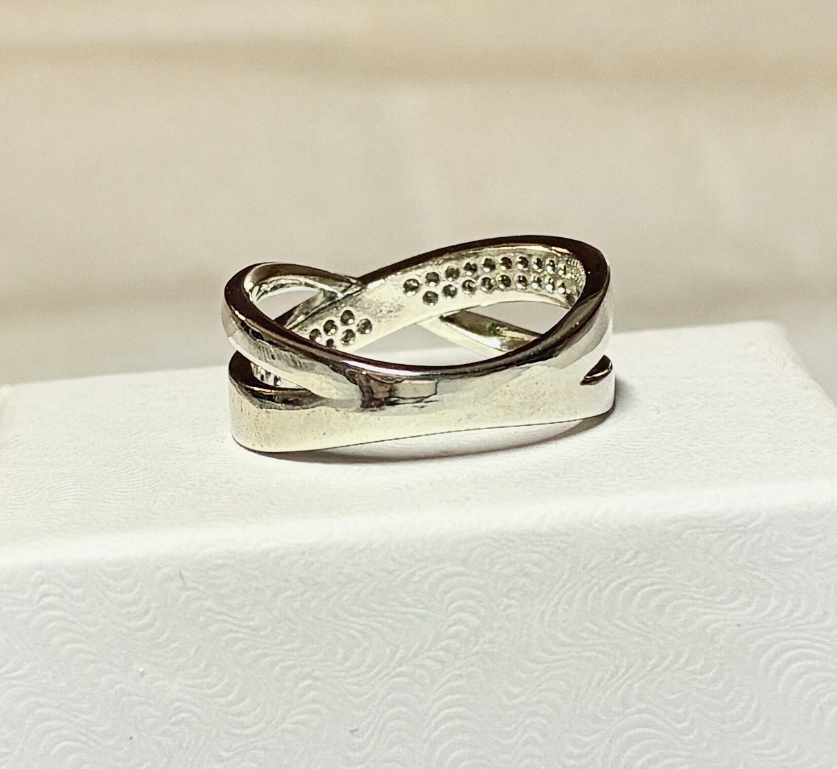 White Sapphire Cubic Zirconia in a 9.25 Sterling Silver Infinity Band Size 9.0