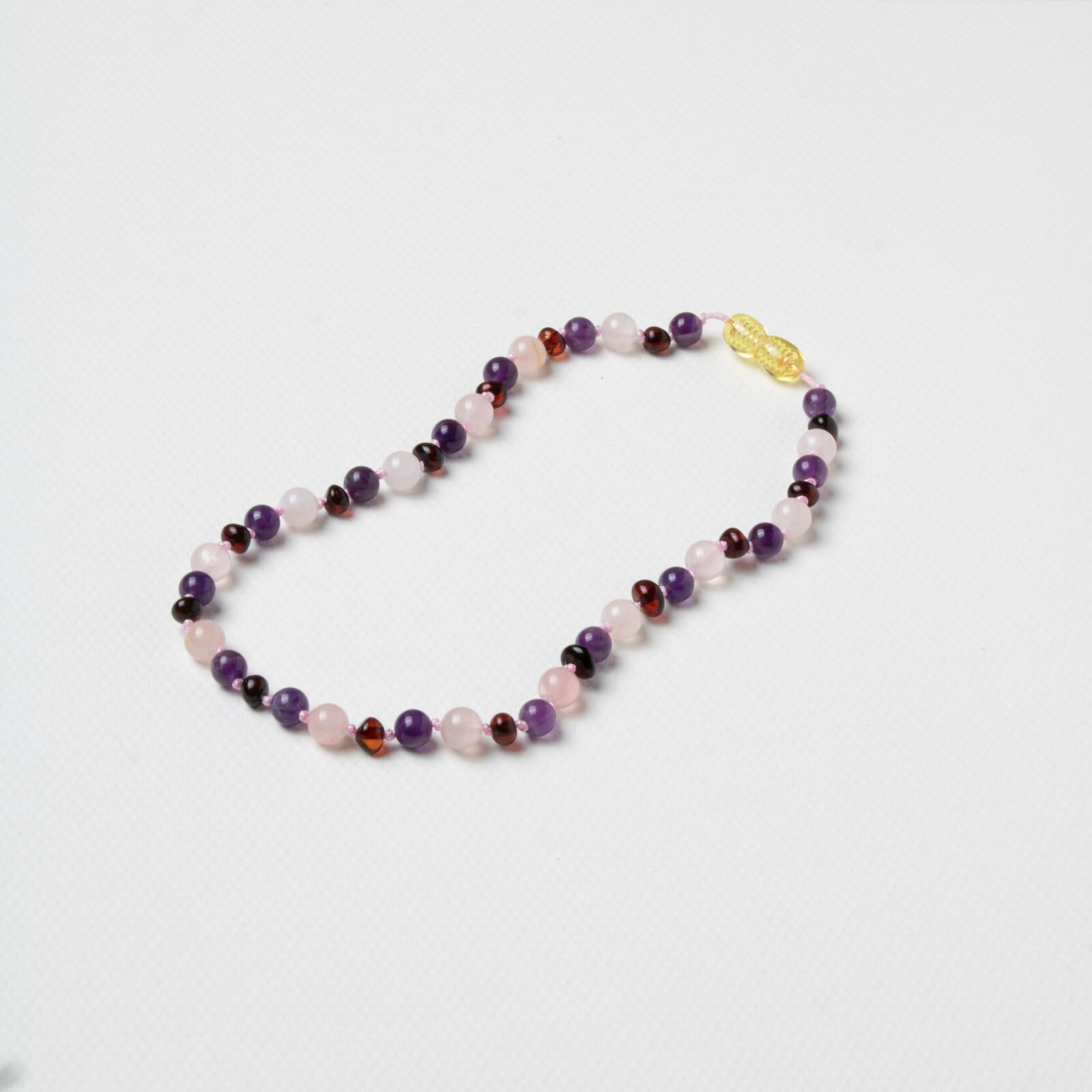 Healing Natural Stone Necklace for Babies – Amber, Rose Quartz, and Amethyst