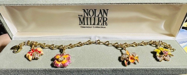 Nolan Miller’s Orchid Charm Bracelet – Approximately 7 Inches