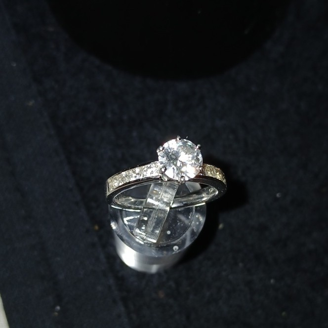 Sterling silver round white CZ solitaire with accents band ring. Size 8