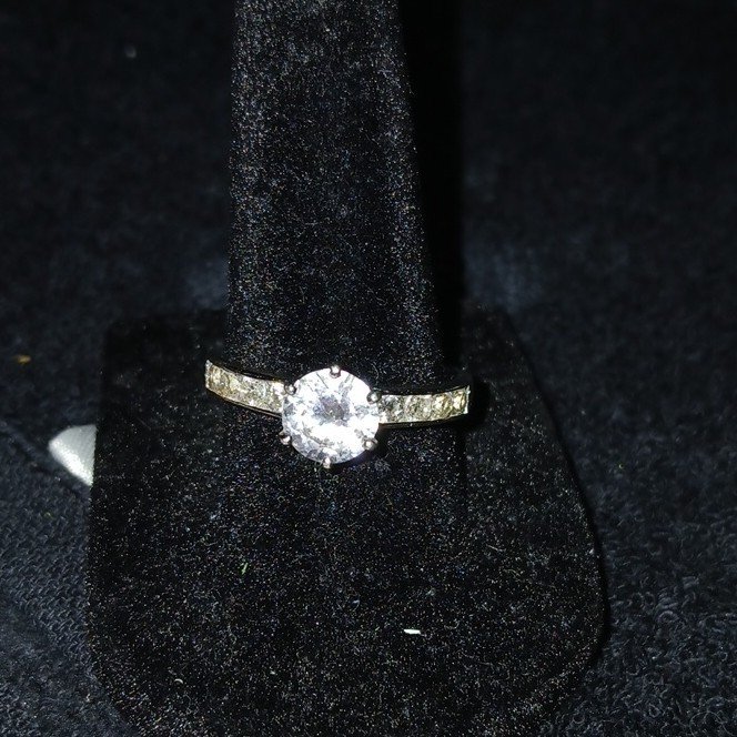 Sterling silver round white CZ solitaire with accents band ring. Size 8