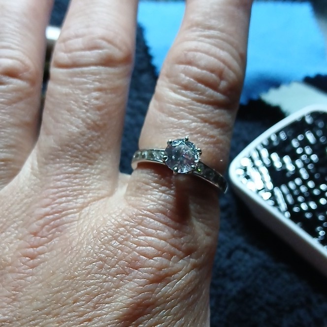 Sterling silver round white CZ solitaire with accents band ring. Size 8