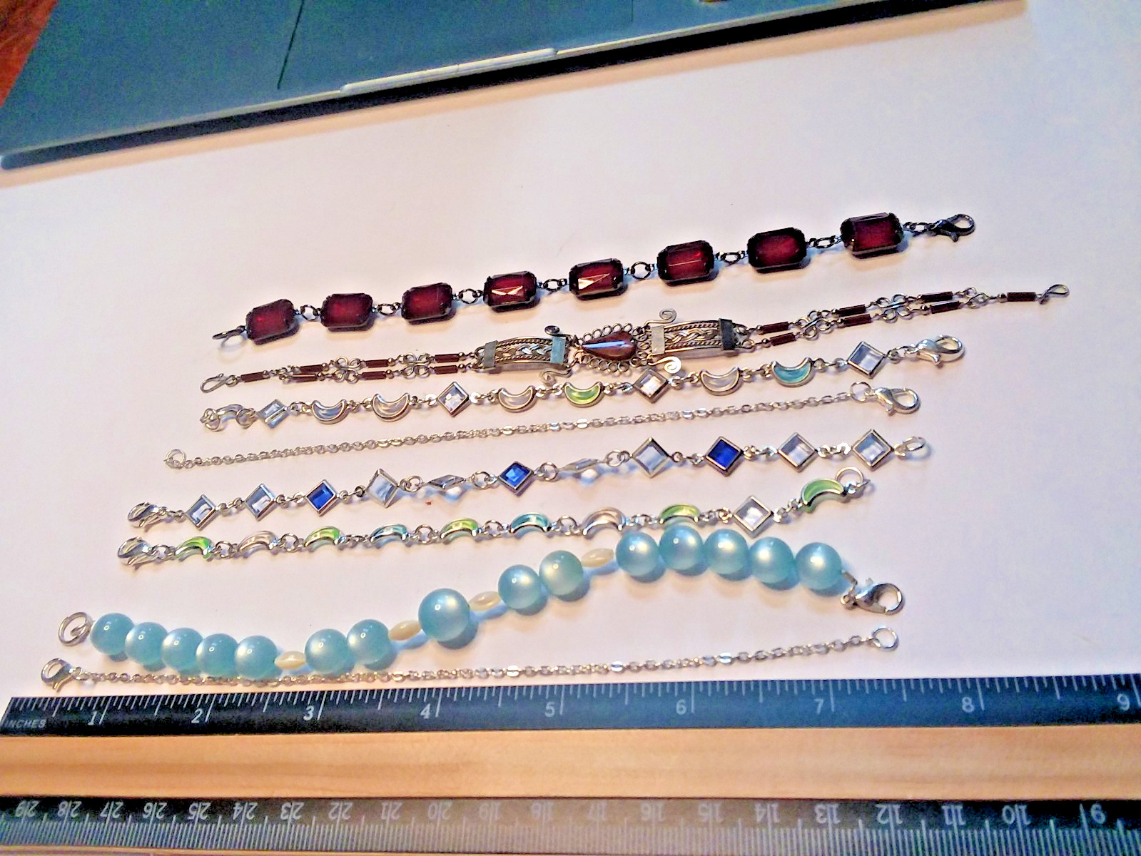 8 Bracelets: 3 Bracelets are Metal, 5 are Plastic 05-01-2026