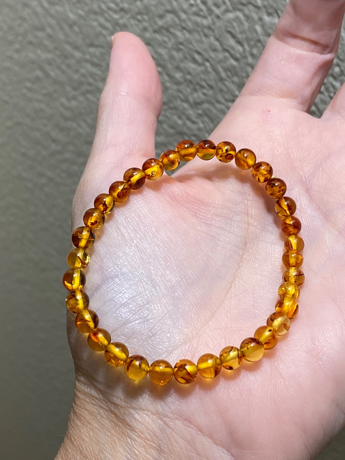 Flower Amber Stretch Bracelet – Approx. 5.8mm Beads – Fits Approximately 7 Inch