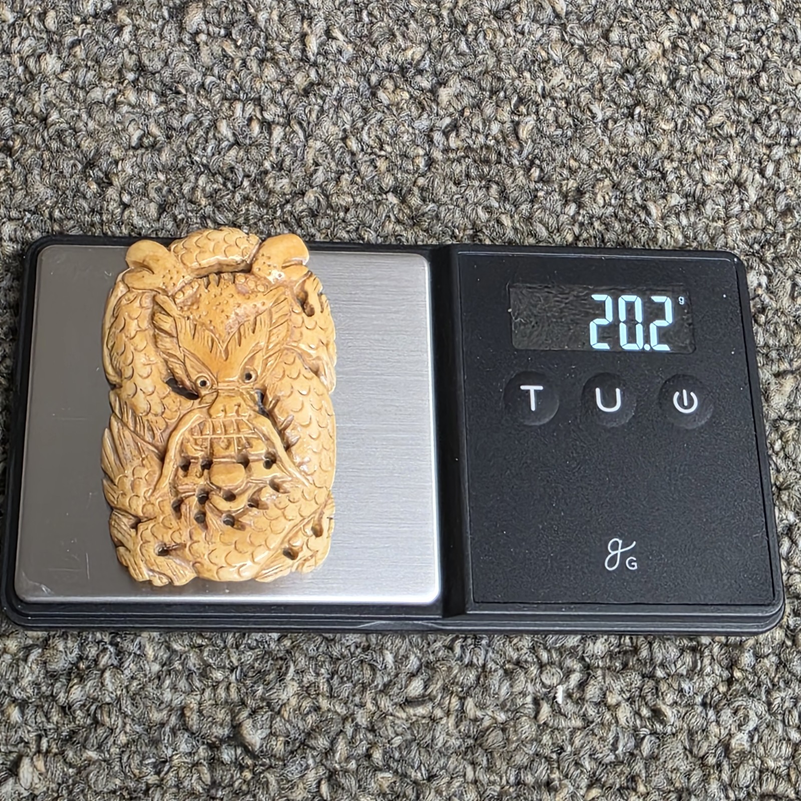 vigorous cow bone carved dragon pendant