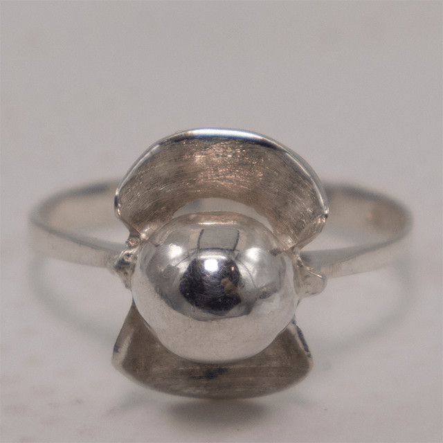 Space Age ring with silver sphere and leaf-shaped elements