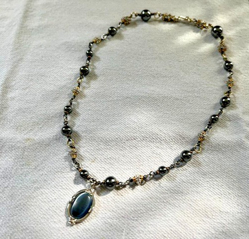 HEMATITE GRAY BEAD NECKLACE WITH SILVER/GOLD TONED SPACERS AND CABACHON PENDANT