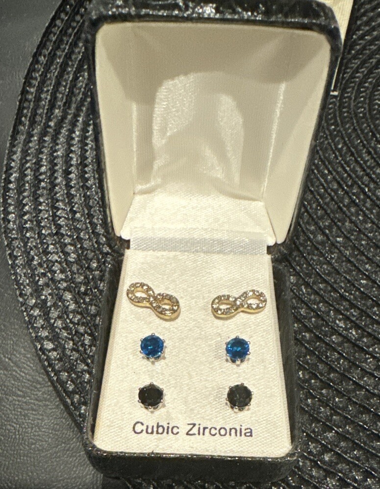 6 pairs of earrings: 3 Pairs of Cubic Zirconia and 3 pair of No Boundaries studs