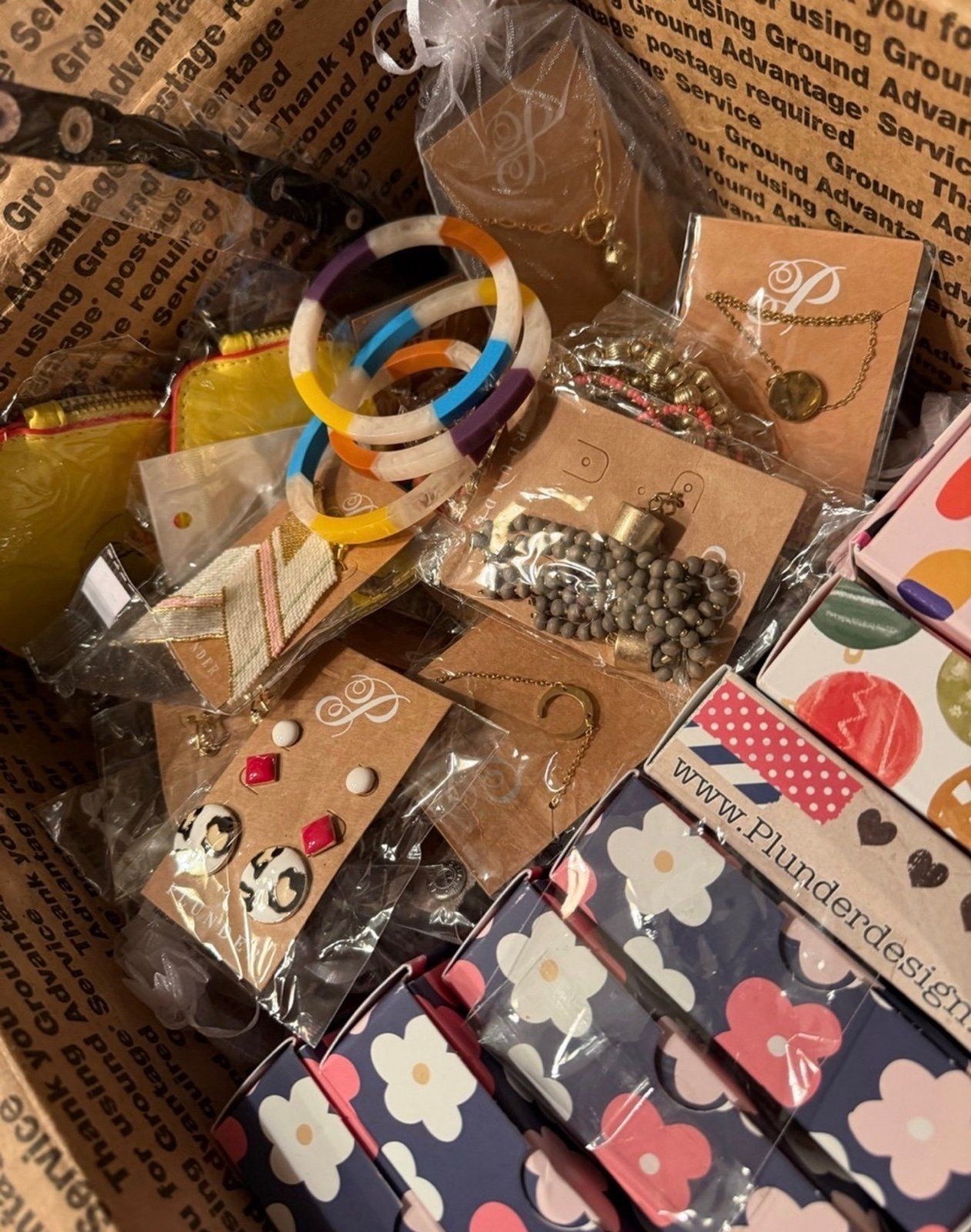 50 pieces varied Plunder jewelry mistery bundle box.