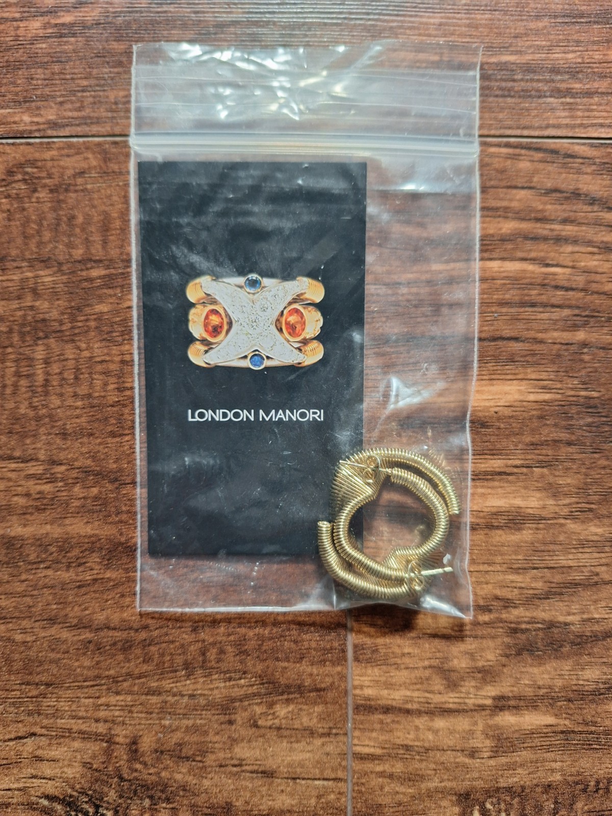london manori ,gold tone, c-shape,hoop earring