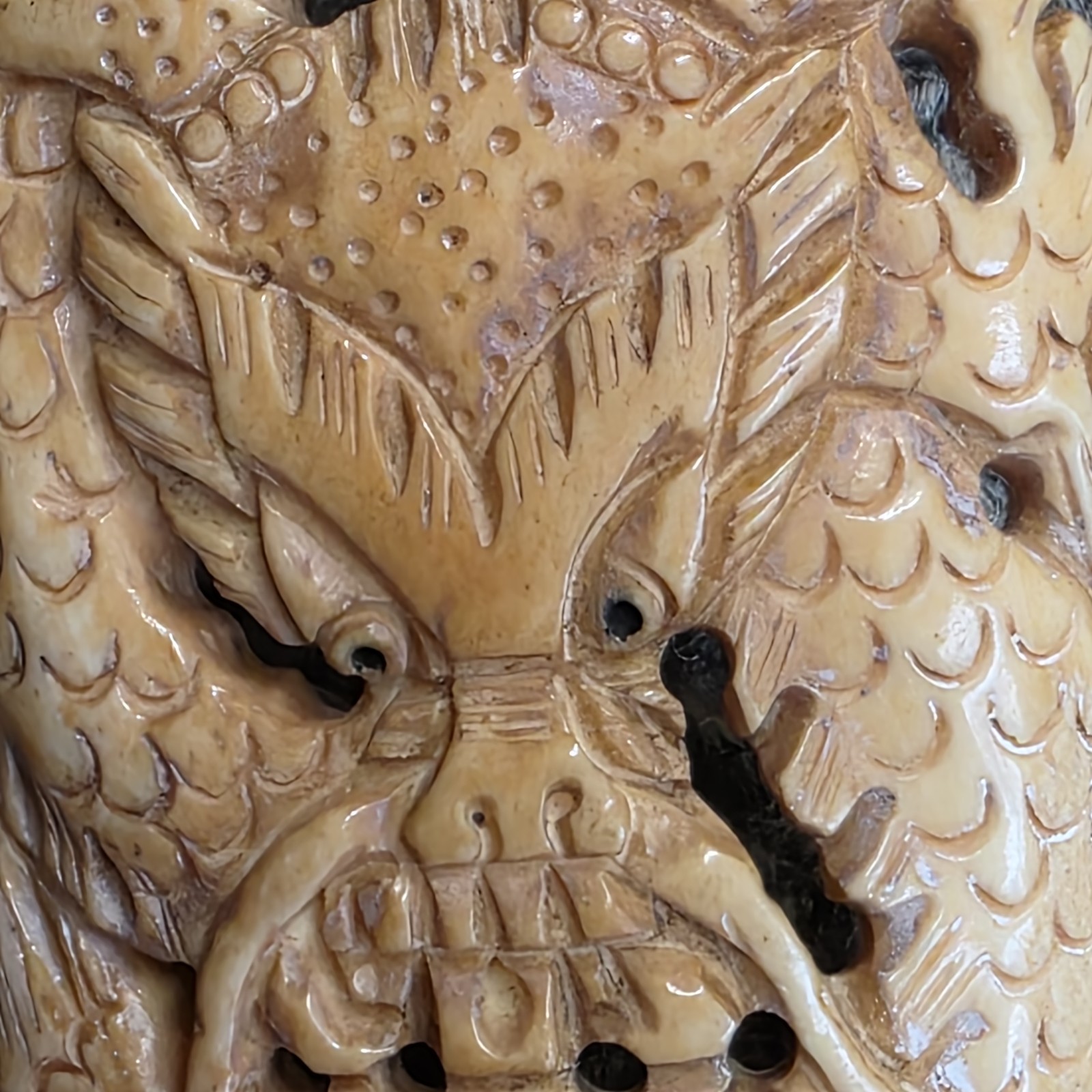 vigorous cow bone carved dragon pendant