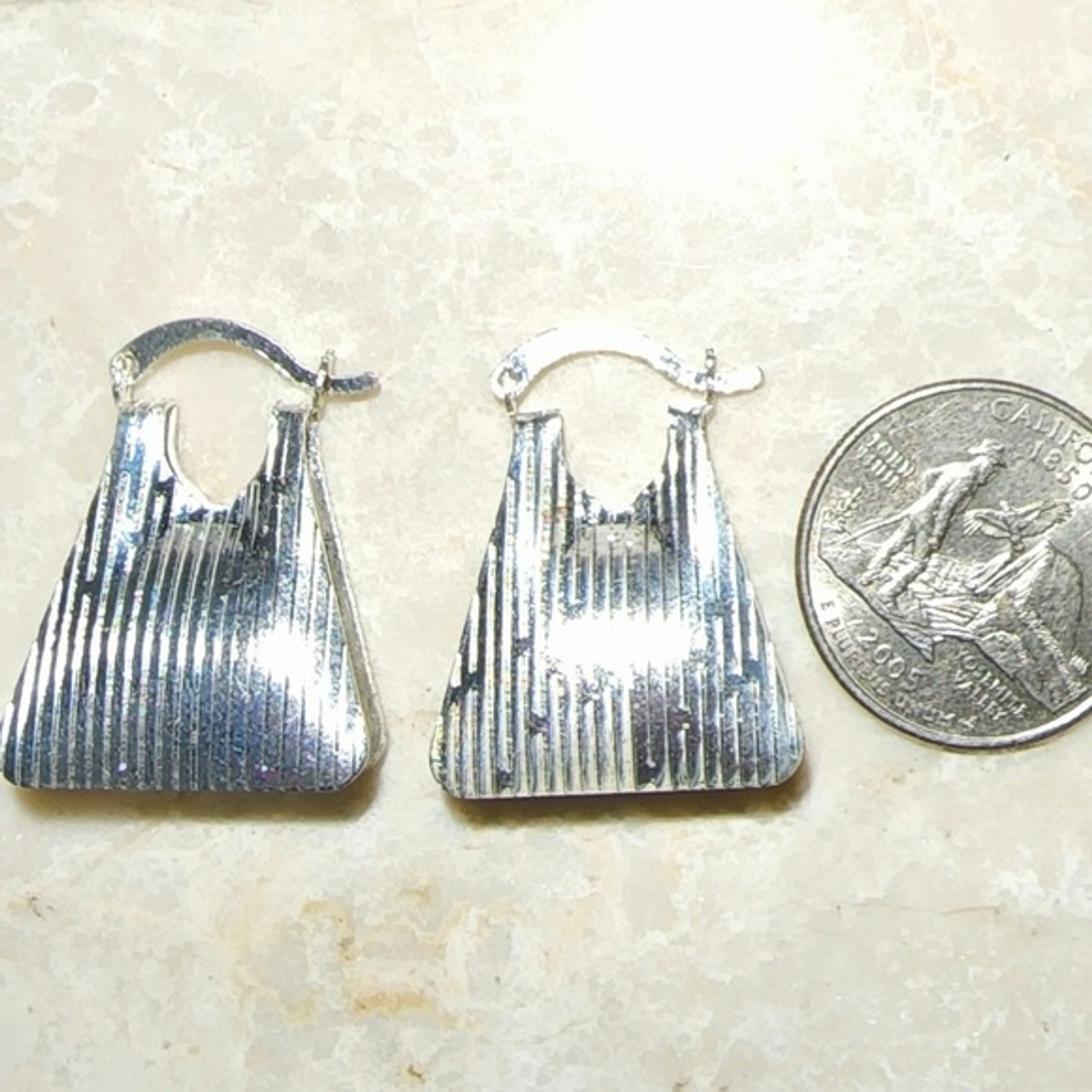 Bright Silver lightweight clasp tote designed earrings