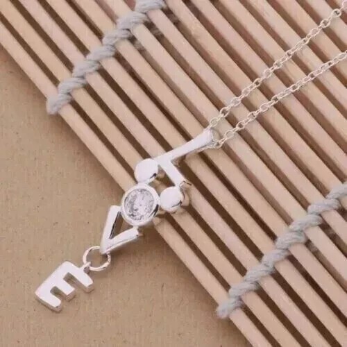 Stunning 1Ct Round Cut Simulated Diamond LOVE Pendant In 14K White Gold Plated