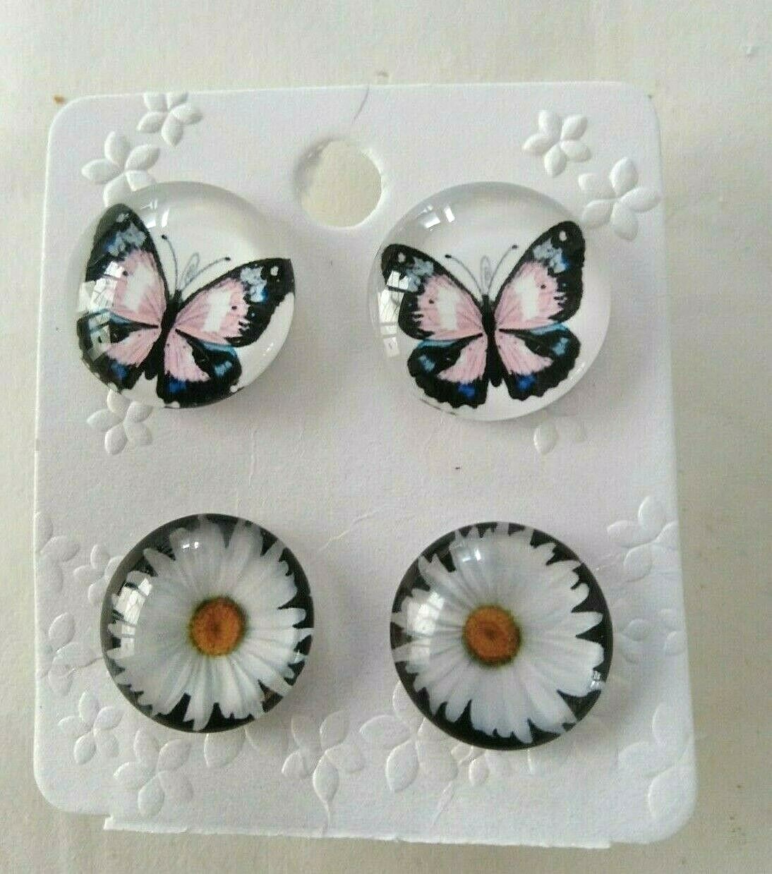 2 different pairs of large 15/13 mm wide acrylic button style earrings