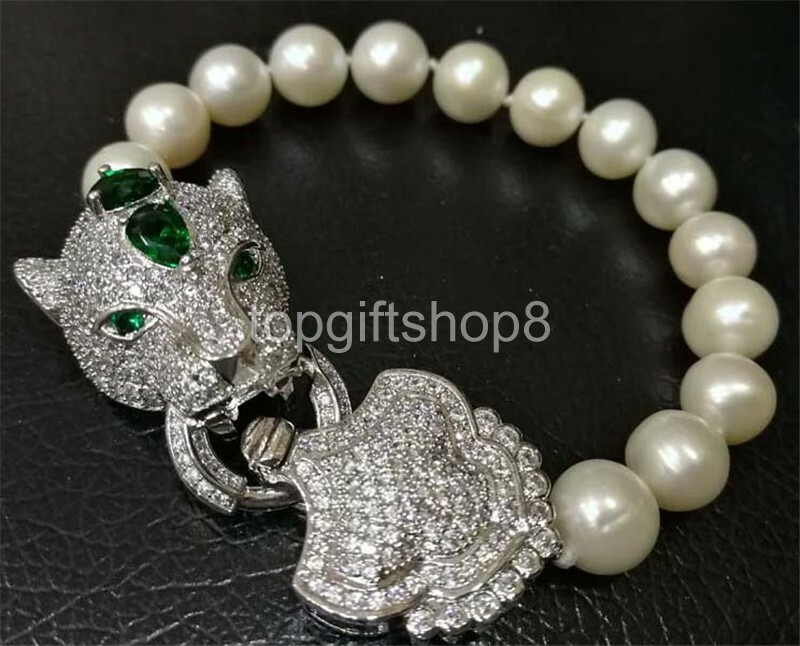 white freshwater pearl near round 10-11mm bracelet leopard clasp 8″