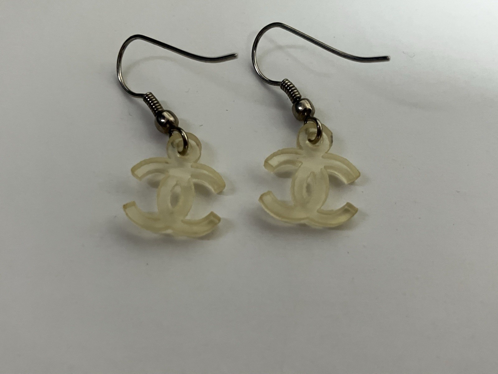 Authentic Vintage CHANEL CC Logo Resin Hook Earrings 95C Cruise Ivory w/ Box