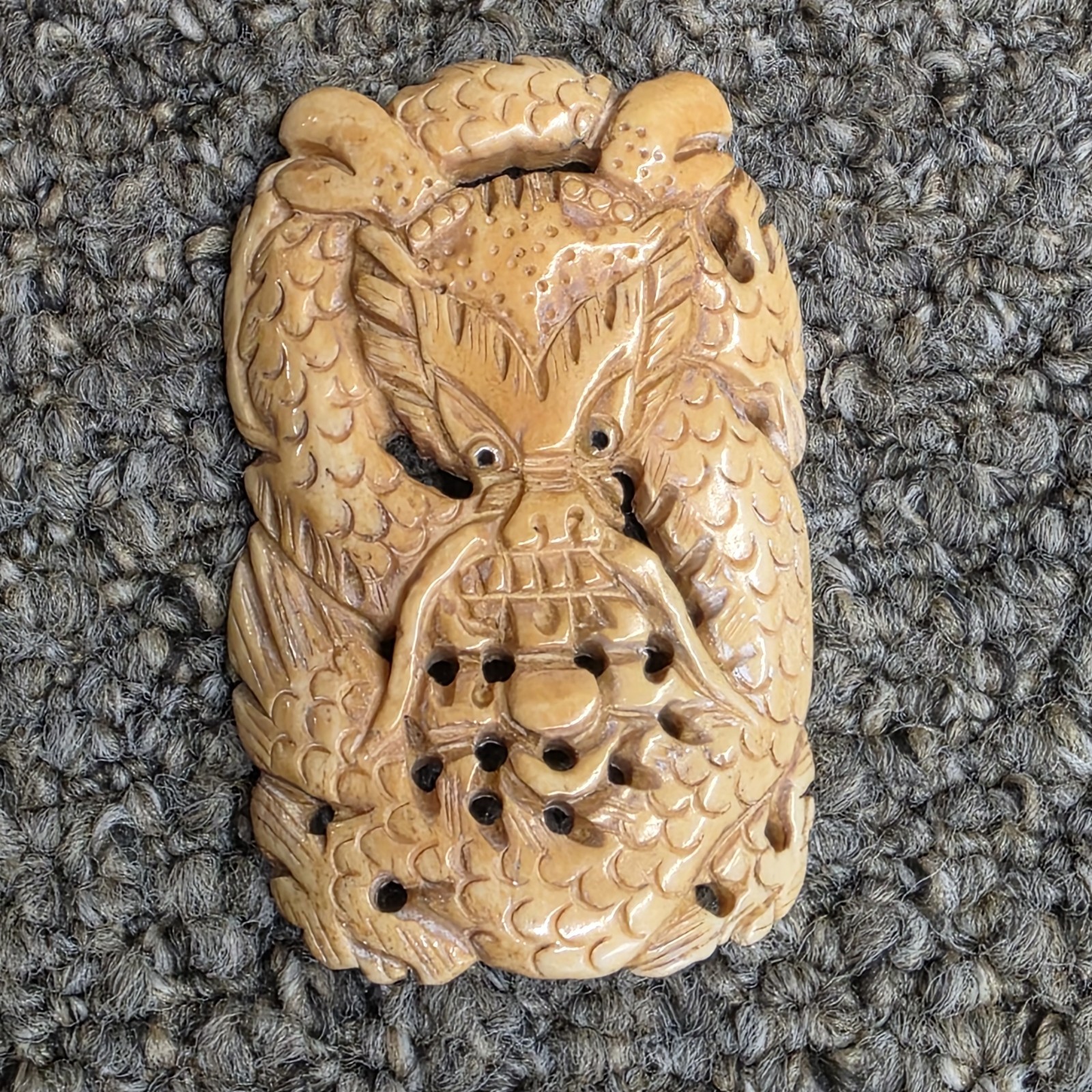 vigorous cow bone carved dragon pendant