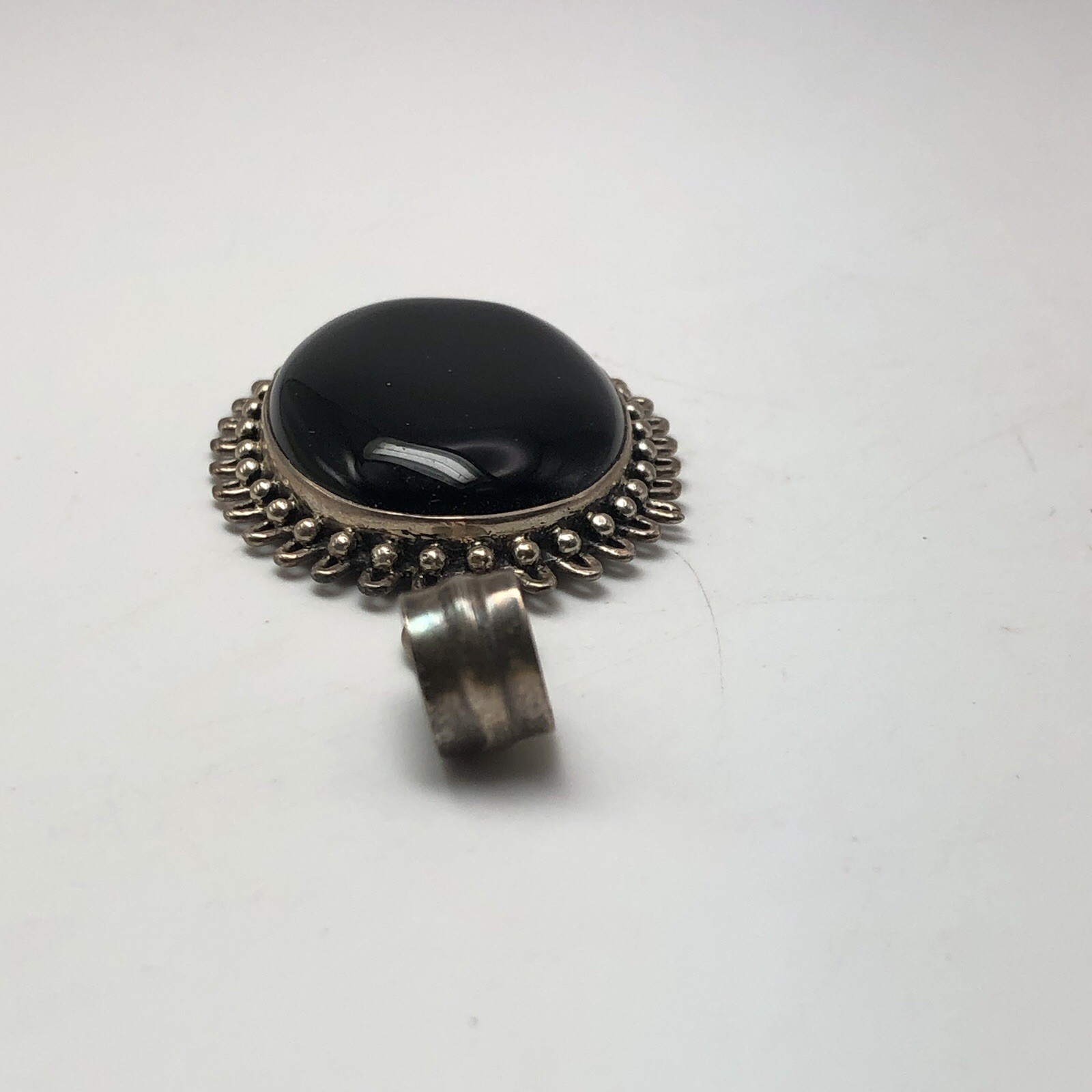 Black Onxy Oval Cabochon Pendant Bezel Set In Sterling Silver