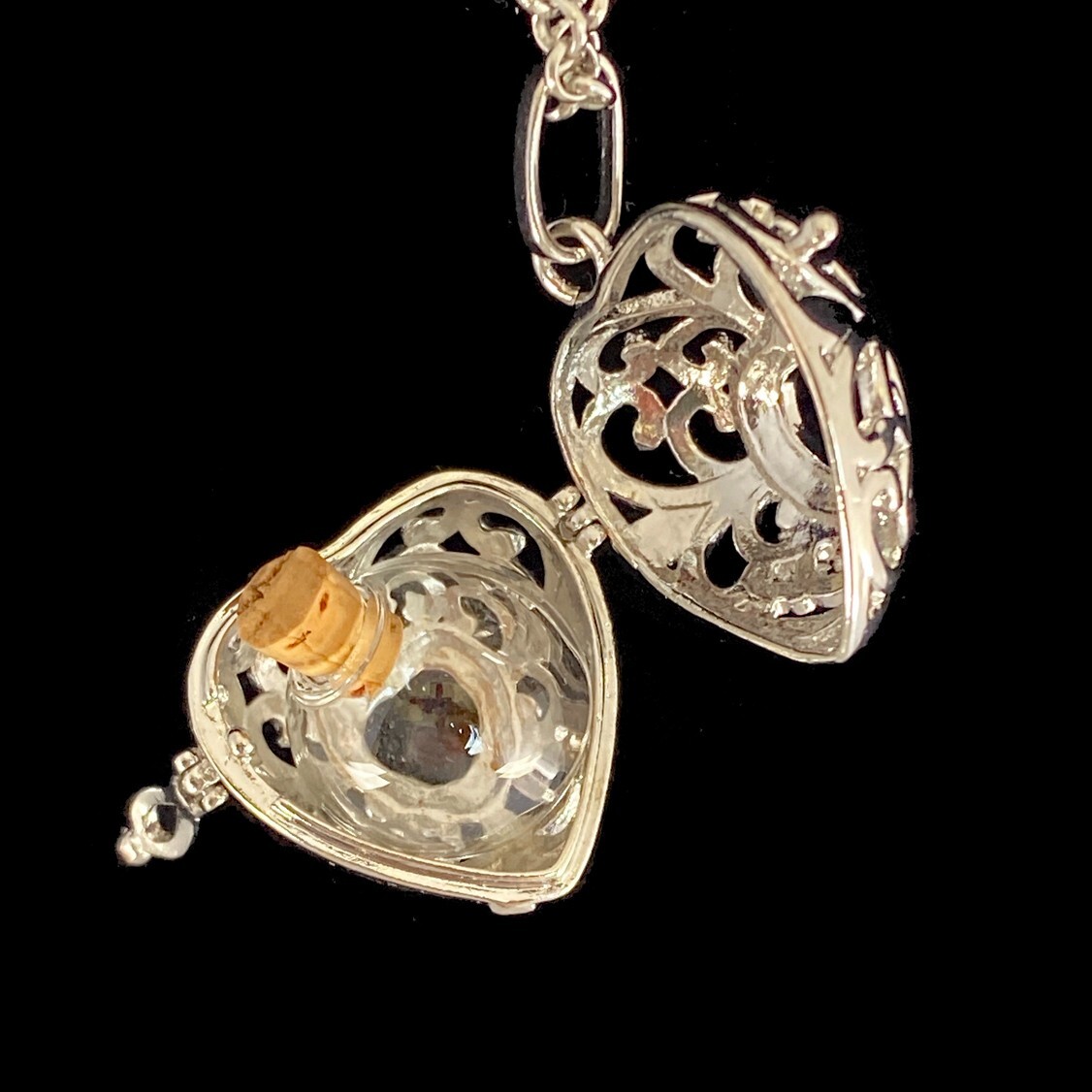 Silver tone Aromatherapy Filigree Heart Locket on Long Chain