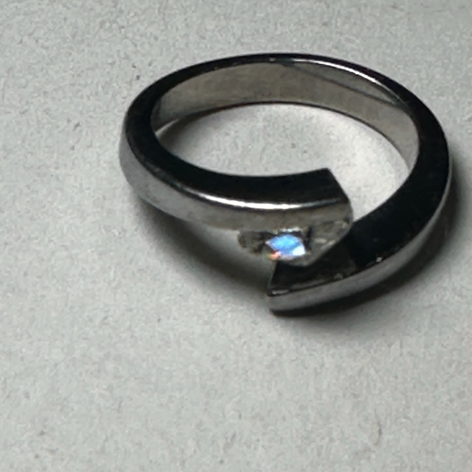 Silver Tension Set Ring with Round White Stone Minimalist Design