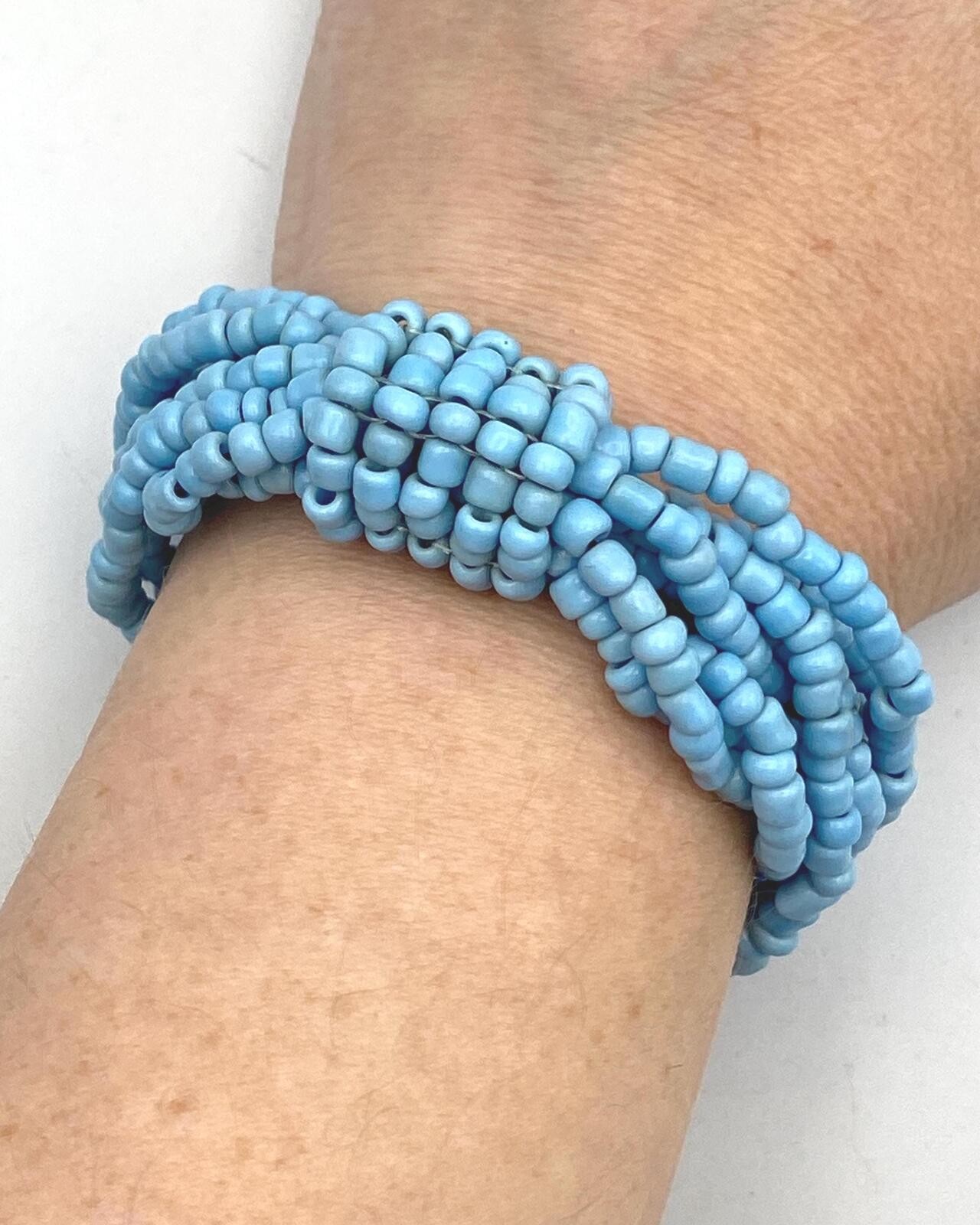 Vintage Blue Glass and Black Elastic Beaded 8 Strand 7 Inch Elastic Bracelet.