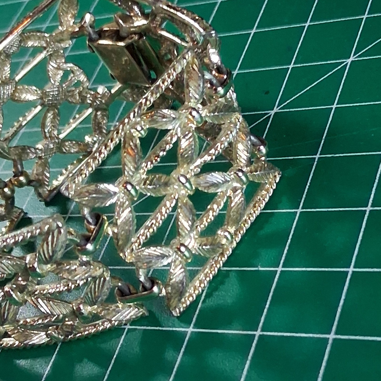 Vintage Cora Silver Tone Wide Band Floral Design Fold Over Clasp Bracelet