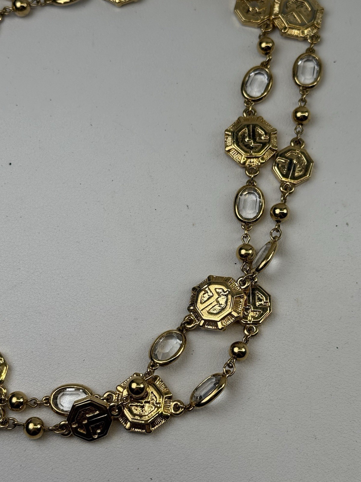 St. John Vintage 38″ Long Gold Tone Logo Necklace Clear Bezel Stations
