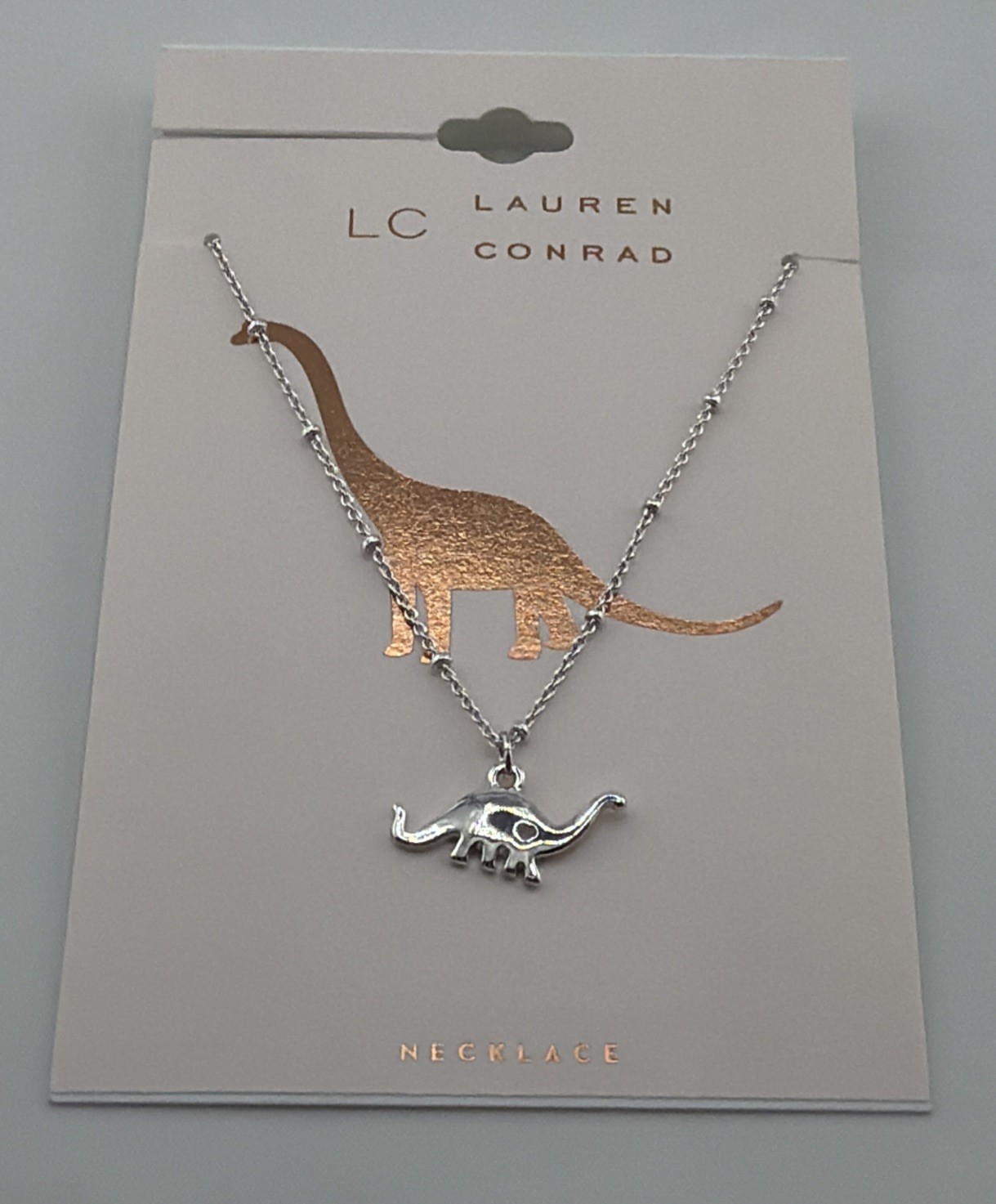 LC Lauren Conrad Dinosaur Pendant Necklace 16″ Silver Tone Prehistoric Charm.
