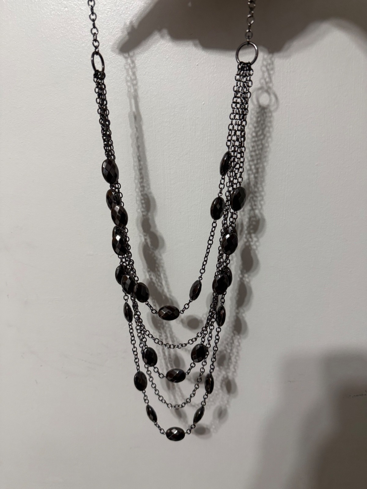 Stylish Susan Graver multi-strand necklace featuring black-tone chains