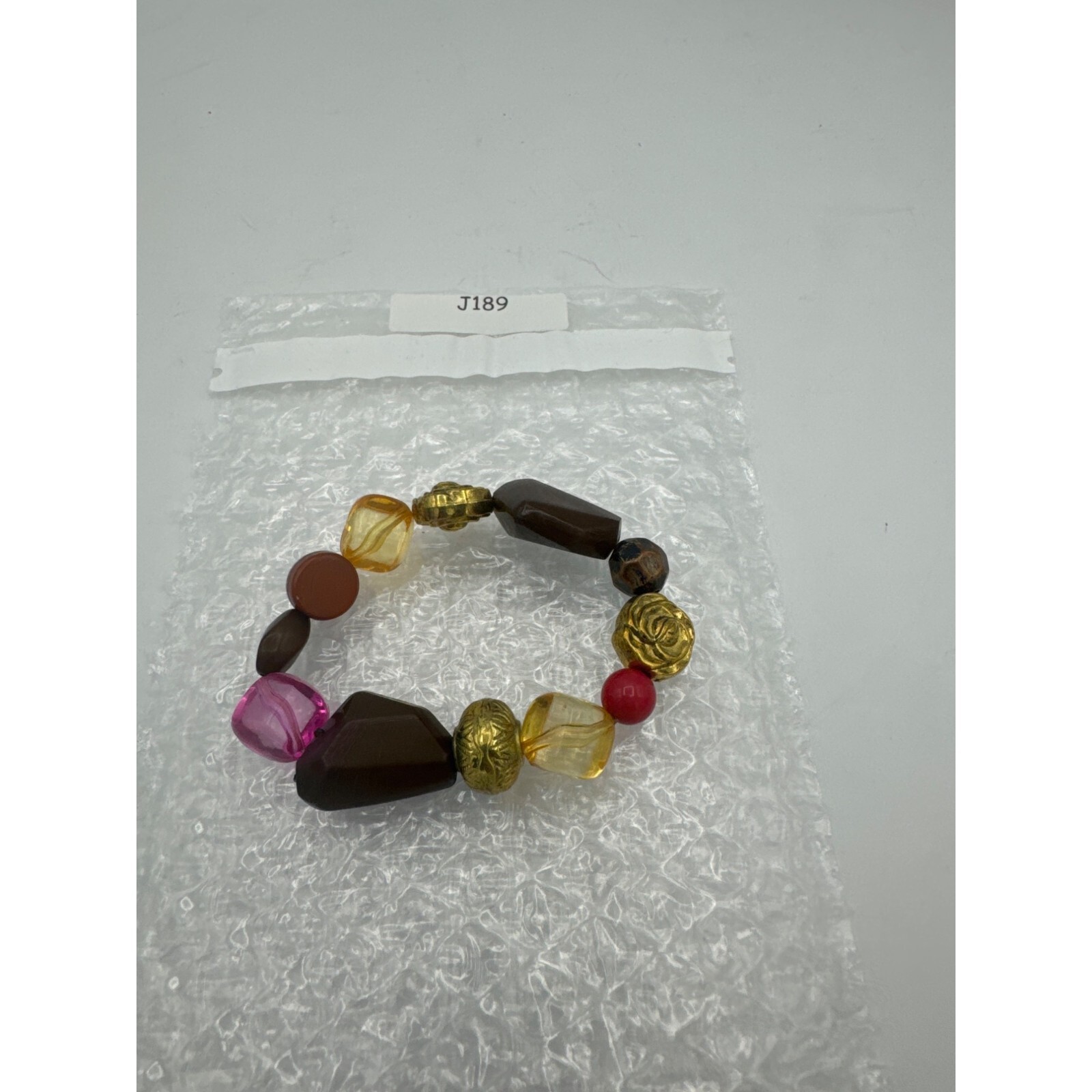 Multi colored Plastic and Metal Assorted Bead Stretch Bracelet