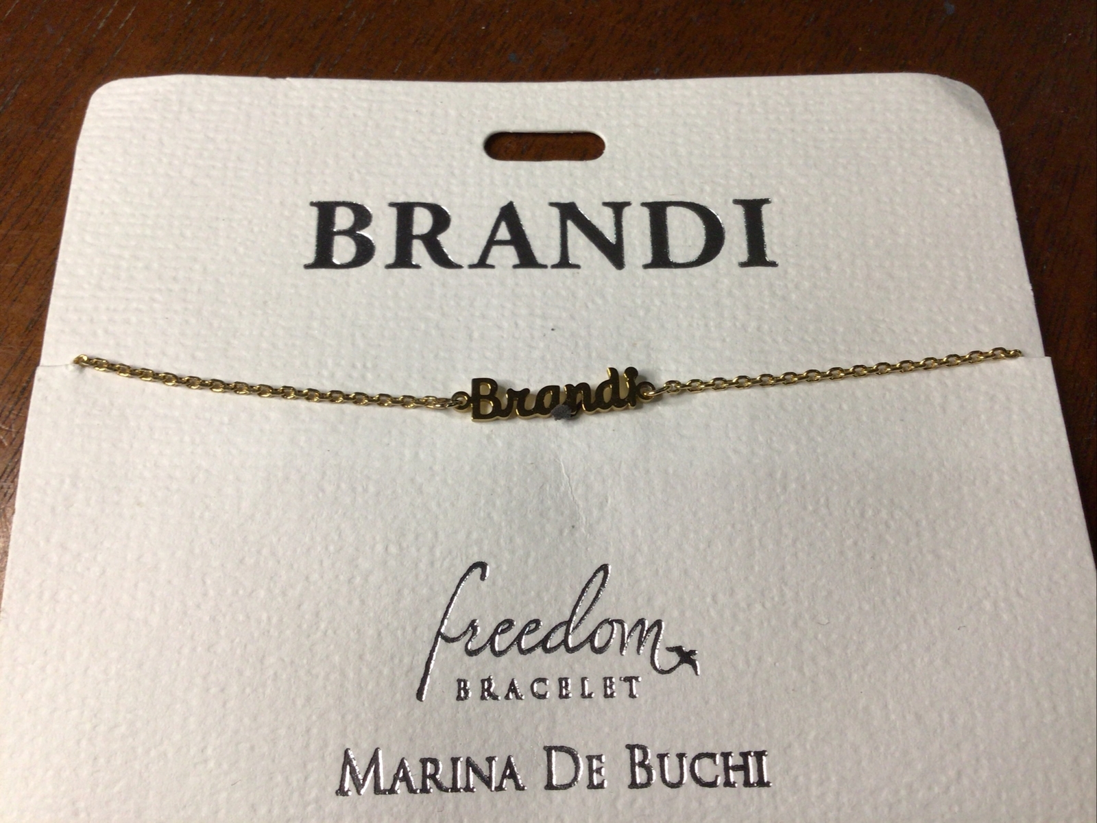 MARINA DE BUCHI BRANDI Freedom Name Bracelet Gold Tone Stainless Steel NWT