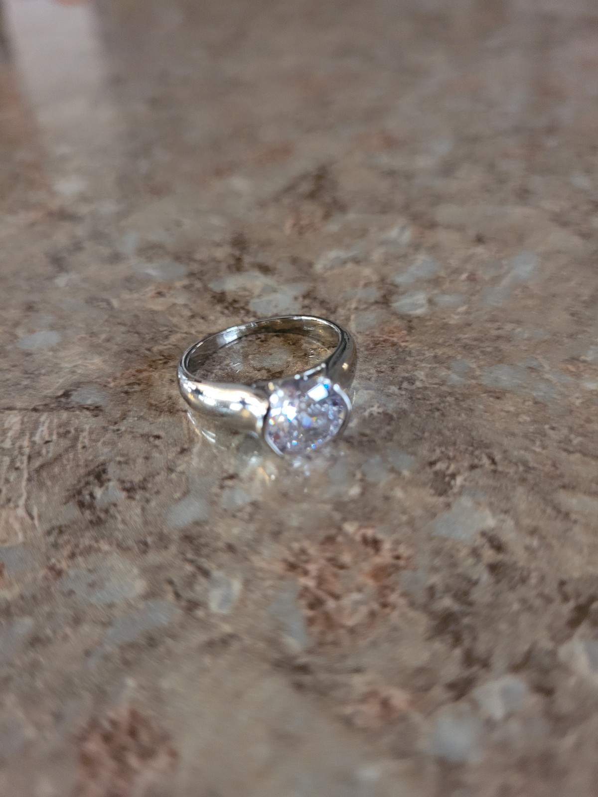 Silver-Tone Solitaire Ring with a Clear Round-cut Crystal Stone