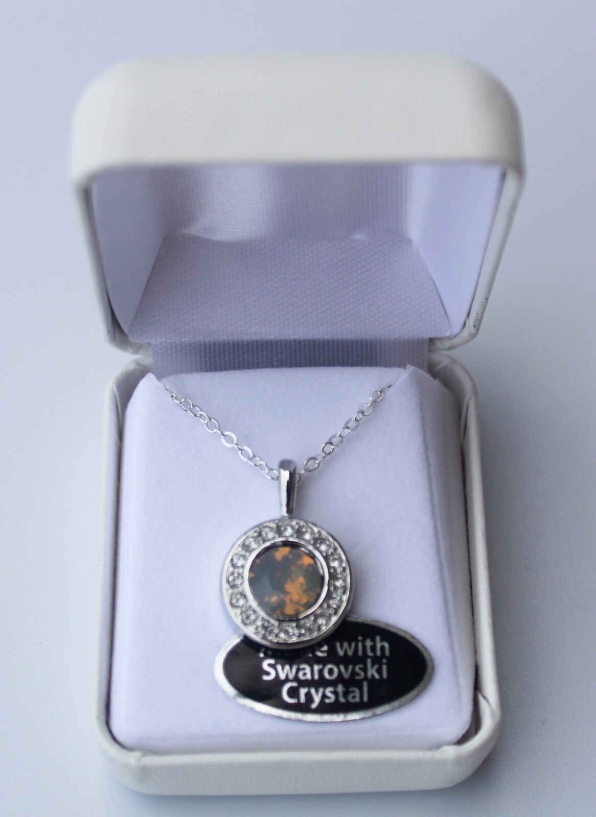 Swarovski round crystal with cloud like color