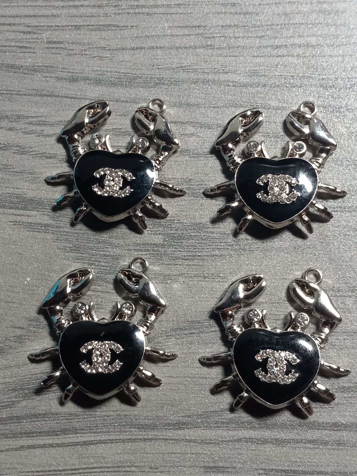 Lot Of Four Chanel Designer Silver Tone & Black Crab Pendant with faux Diamonds