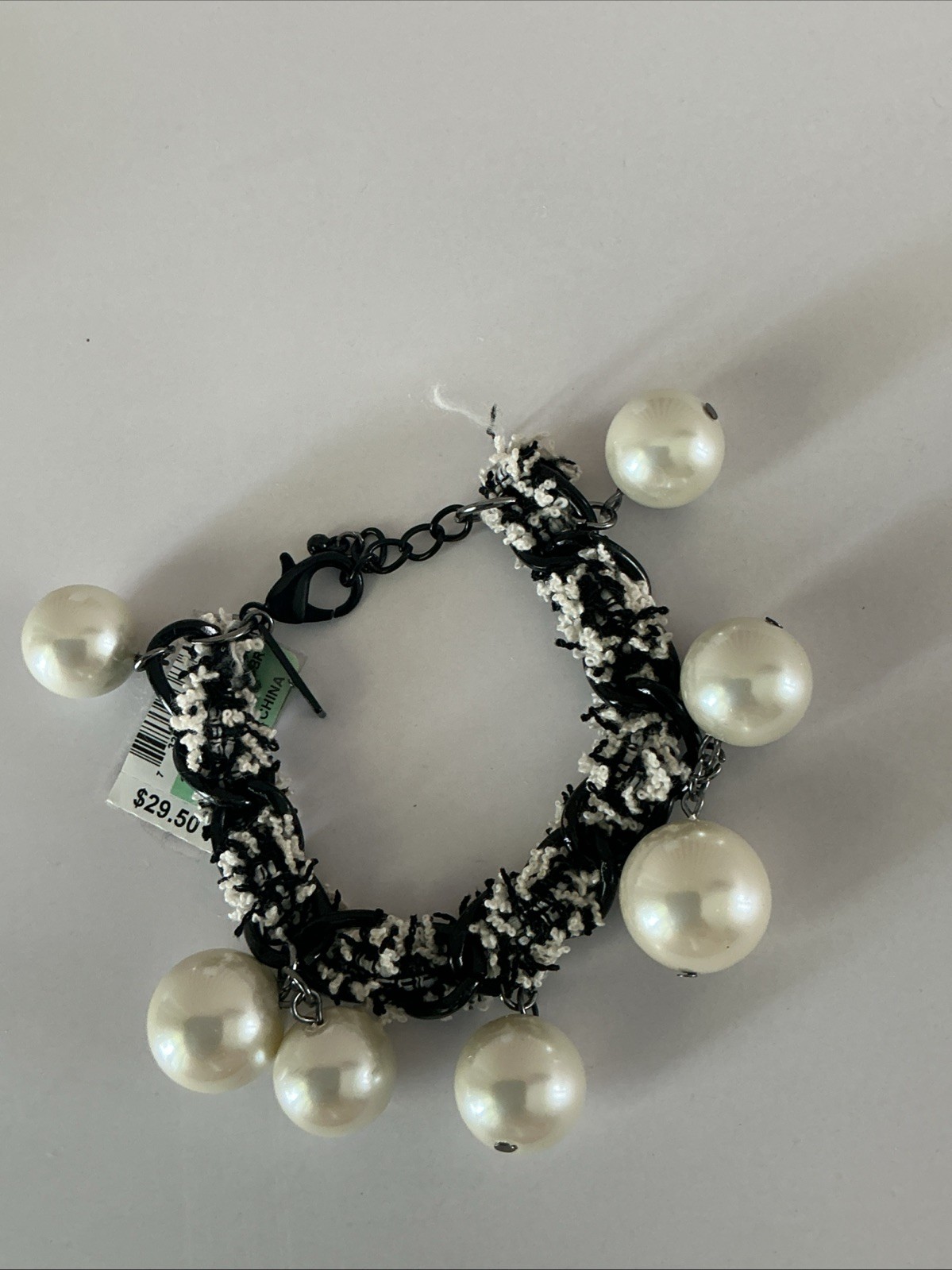 .I.N.C. International Concepts bracelet features black and white fabric