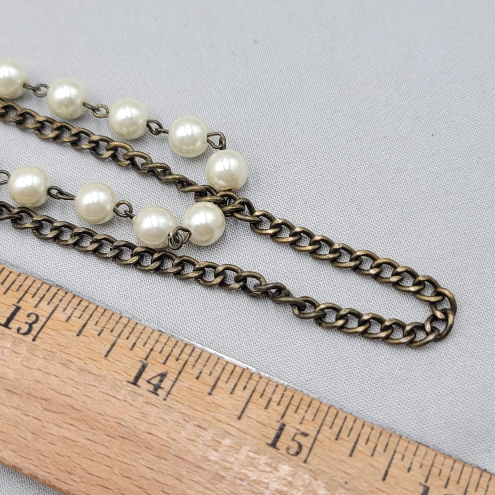 Embossed Metal Bird White Bead Necklace Bronze tone Chain 32″