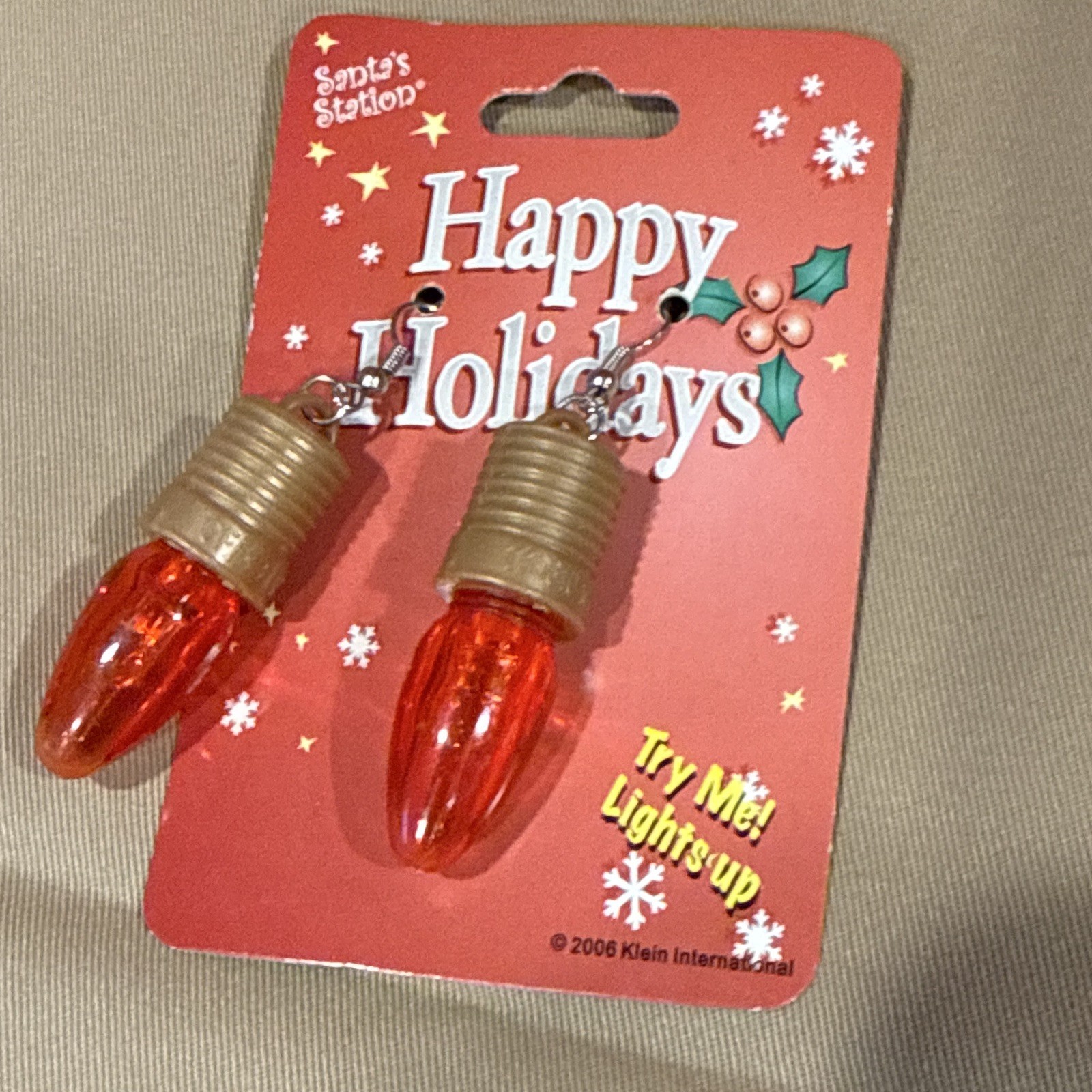 Santa’s Station Light Up Christmas Light Bulb Hook Dangle Earrings Red Gold