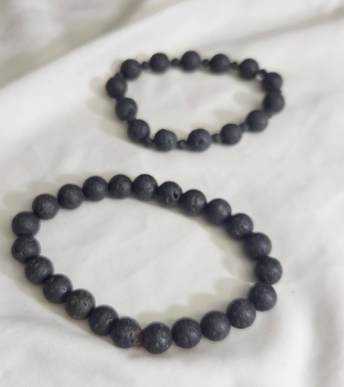 TWO BLACK LAVA STRETCH BRACELETS