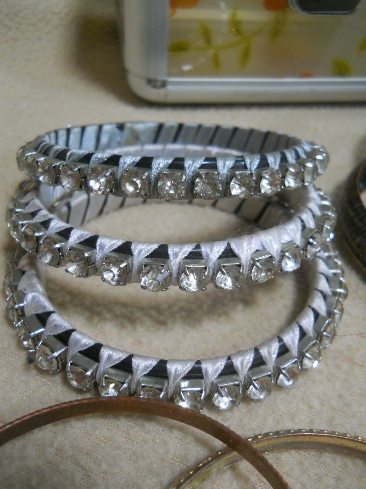 16 Bangle Bracelets with Plastic and Metal Case