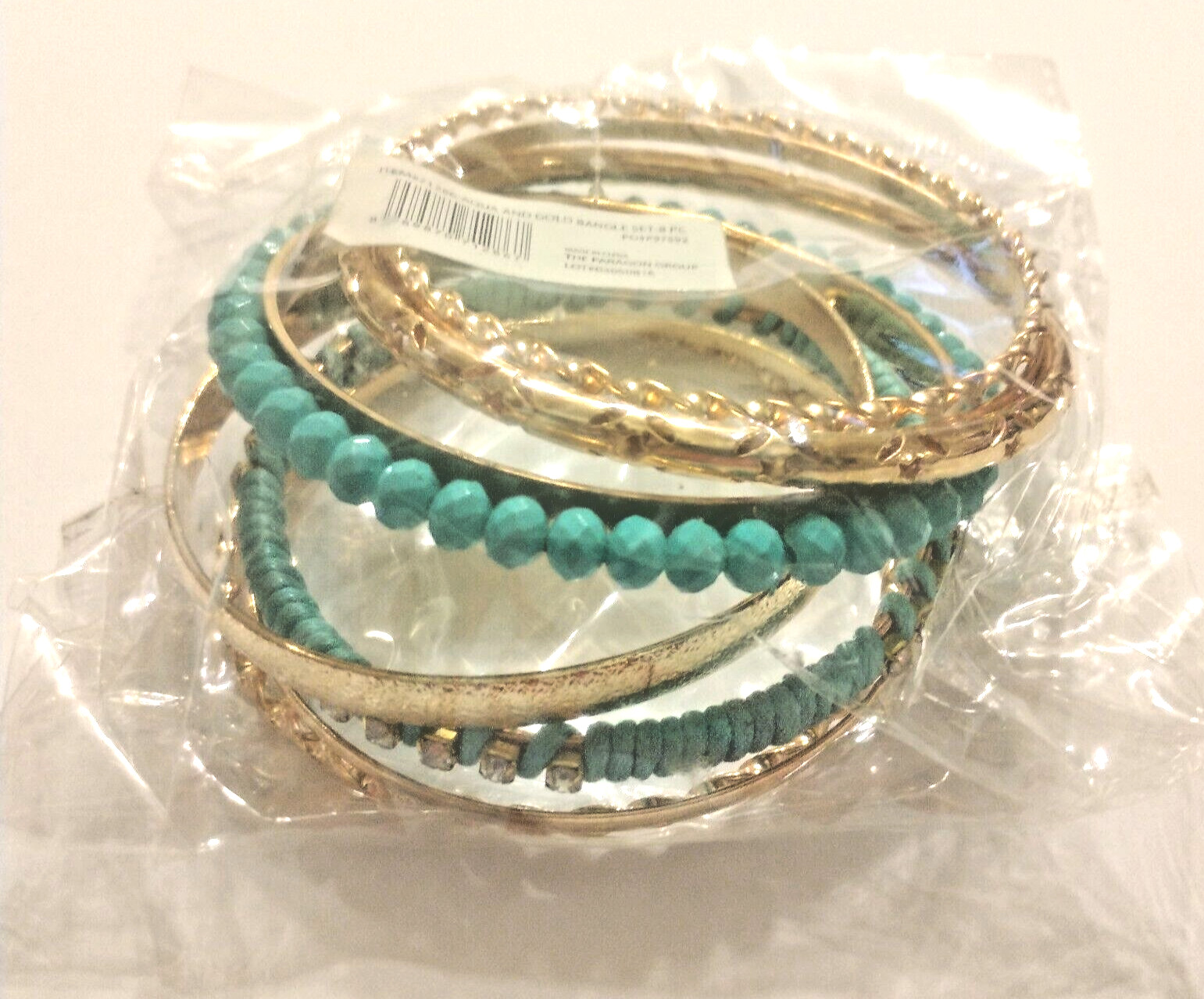 BANGLE BRACELET SET OF 8 (EIGHT BANDS) TURQUOISE AND GOLDTONE IN COLOR BRAND NEW