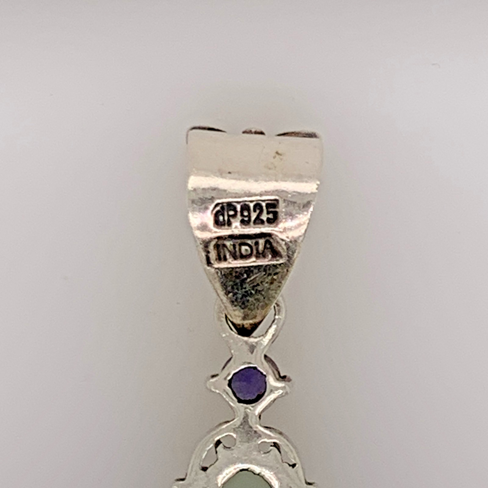 Sterling Silver Doug Paulus Topaz & Sapphire Swirly Cross Pendant for Women
