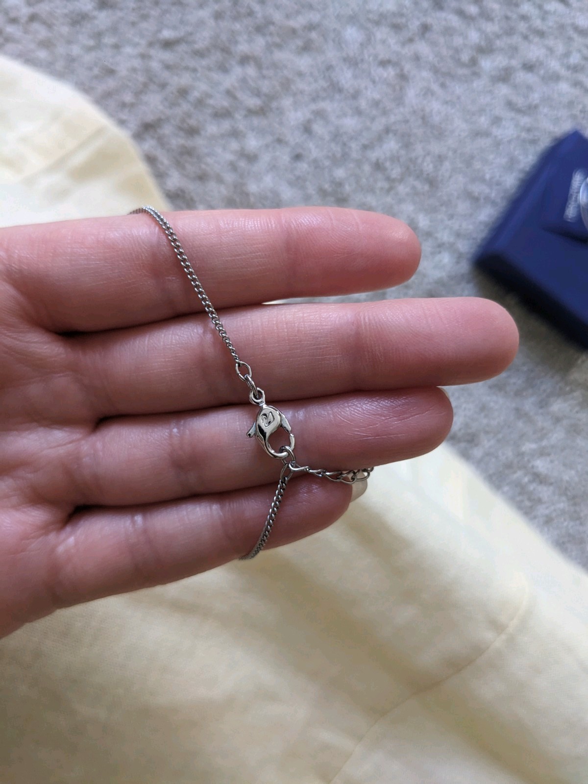 NEVER WORN silver Swarovski Infinity Necklace, in original box with tags, unworn