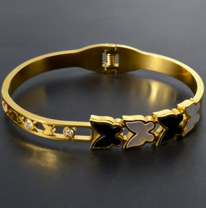 Exquisite Geometric Black and White Butterfly-Accented Stainless Steel Bracelet