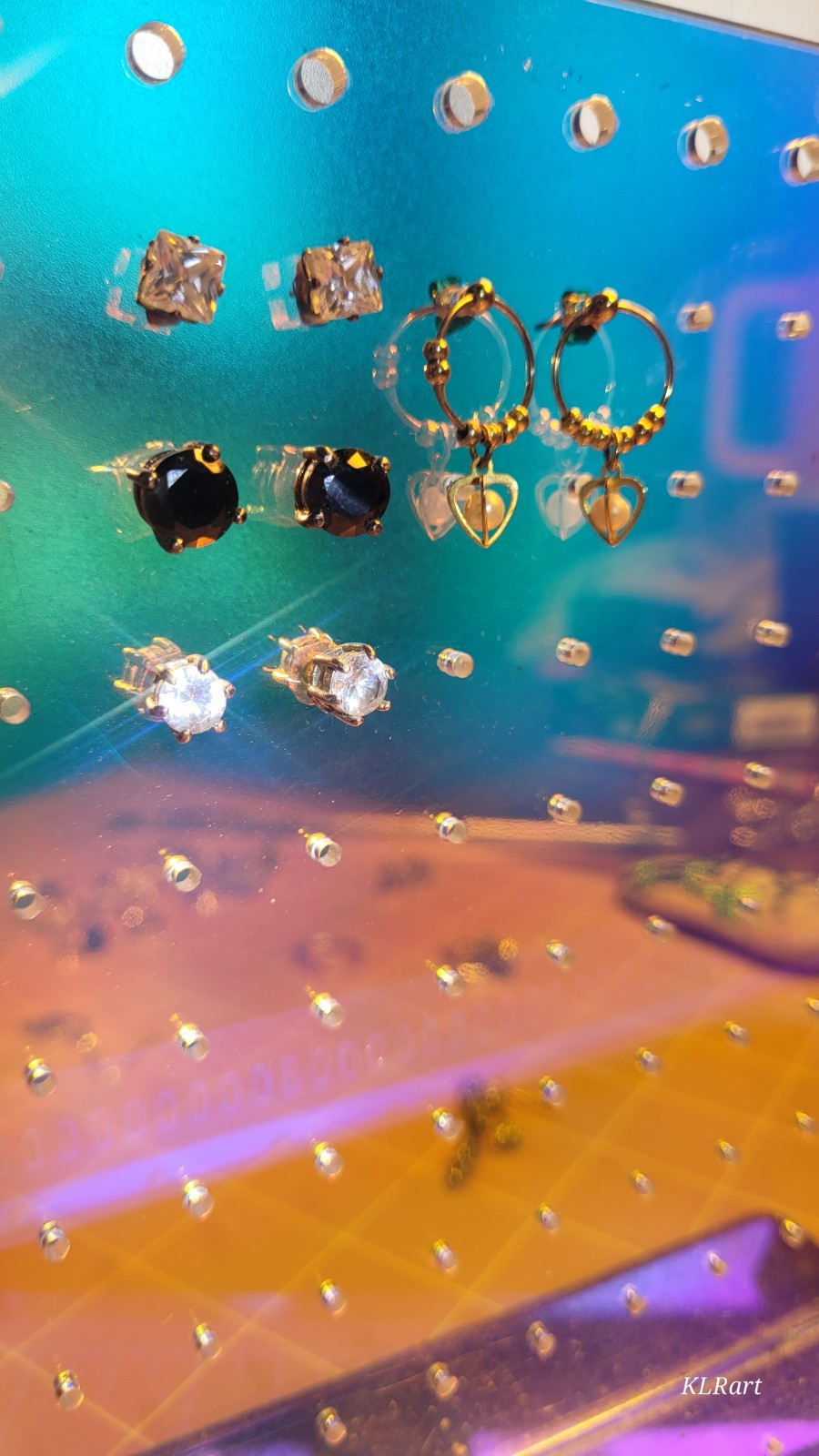 4 pair studs that do sparkle, gold plated pearls, large black Spinal studs